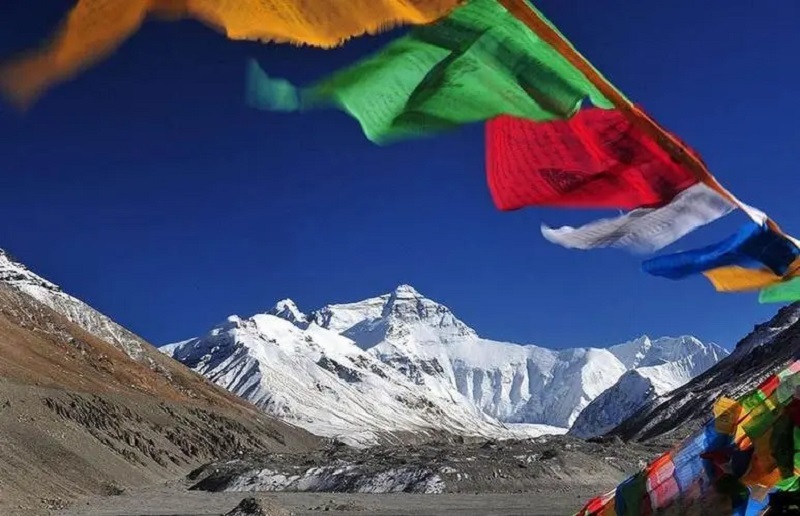 Fluttering prayer flags in front of Mt.Everest