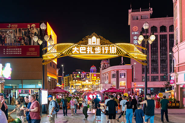Urumqi, China - Jun 29, 2024; Crowds of tourists walking at Xinjiang International Grand Bazaar one of the most famous landmarks in urumqi, Xinjiang