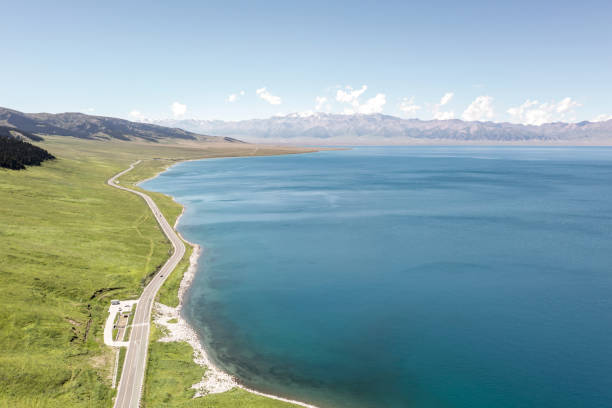 Lake and grassland with a sunny day. Shot in Sayram Lake, Xinjiang, China.